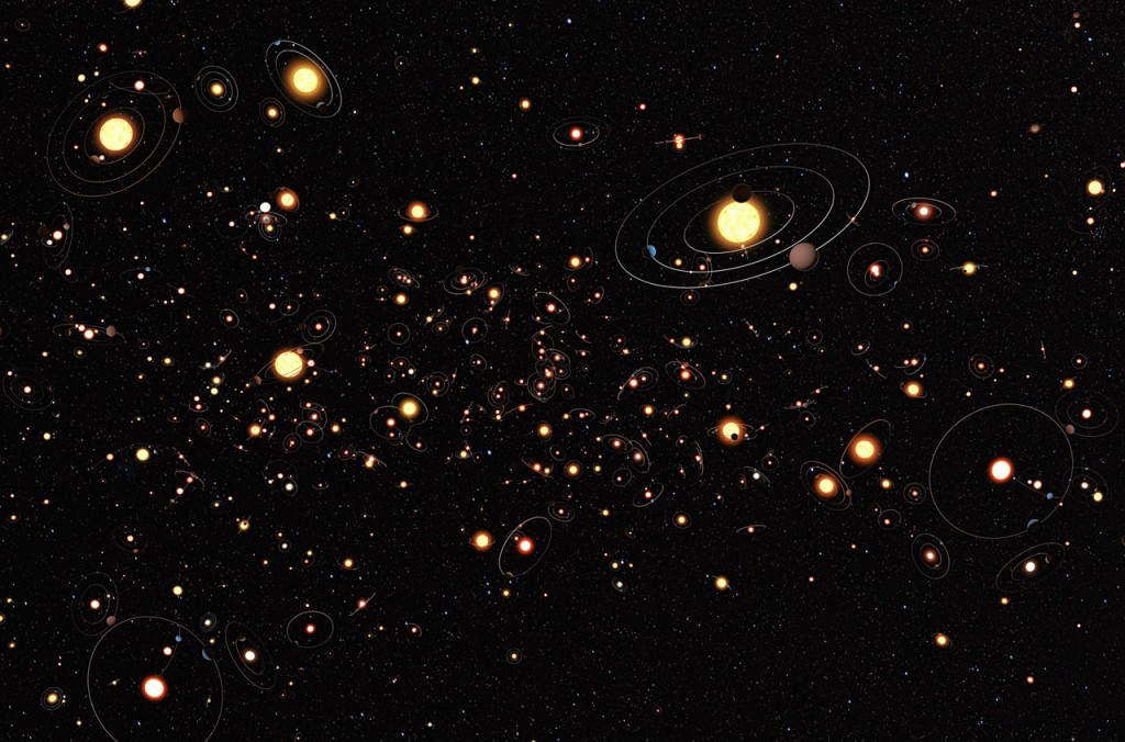 This artist's impression shows how common planets are around the stars in the Milky Way. The planets, their orbits and their host stars are all vastly magnified compared to their real separations. Credit: ESO/M. Kornmesser