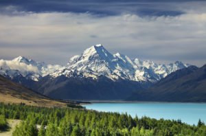 Big mountain range and small body of water