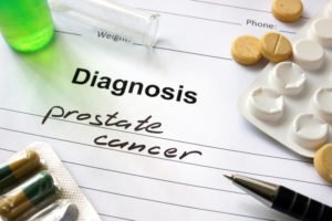 Diagnosis prostate cancer written in the diagnostic form and pills.